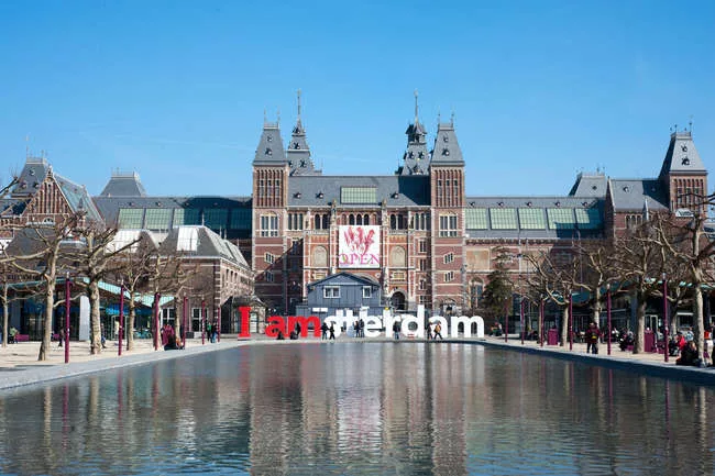 The Rijksmuseum shares a prime public square with its neighbor, the Stede­lijk, also recently reopened following a renovation and expansion.<br />