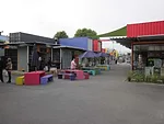 Re:START is a temporary shopping center and public space in  Christchurch, built of brightly colored, artfully arrayed shipping  containers.