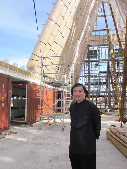 Architect Shigeru Ban in front of his 'cardboard cathedral' in Christchurch, New Zealand.
