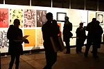 Event guests browse work in the benefit's silent auction.