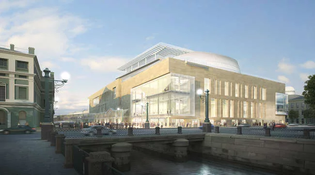 The Mariinsky II section revealing the glazed entrance (right), a glass feature stair (center), and onyx wall (center) that envelopes the performance hall.