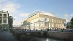 The Mariinsky II section revealing the glazed entrance (right), a glass feature stair (center), and onyx wall (center) that envelopes the performance hall.
