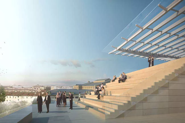 The Mariinsky II section revealing the glazed entrance (right), a glass feature stair (center), and onyx wall (center) that envelopes the performance hall.