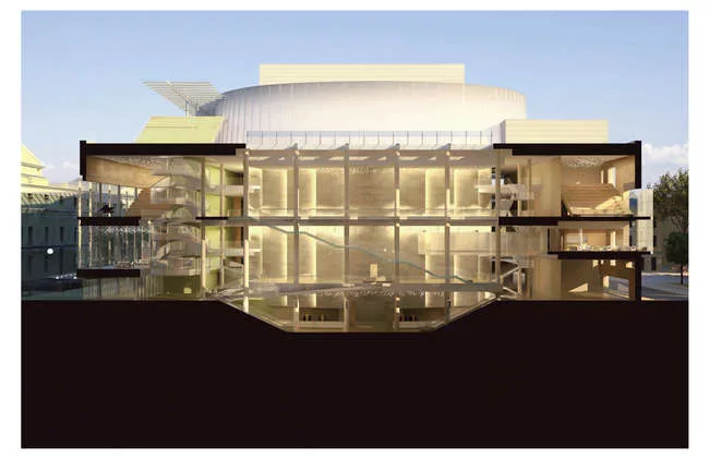 The Mariinsky II section revealing the glazed entrance (right), a glass feature stair (center), and onyx wall (center) that envelopes the performance hall.