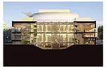 The Mariinsky II section revealing the glazed entrance (right), a glass feature stair (center), and onyx wall (center) that envelopes the performance hall.
