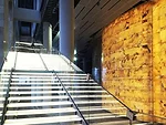 The Mariinsky II glass stair and backlit onyx wall in the lobby during construction.