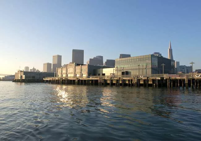 A view from the water of the Exploratorium at Pier 15.