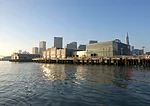 A view from the water of the Exploratorium at Pier 15.