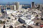 The 11th Sharjah Biennial sprawls through more than a dozen venues in and around the emirate’s Heritage Area on the eastern bank of Sharjah Creek. (The Persian Gulf is visible in the background.