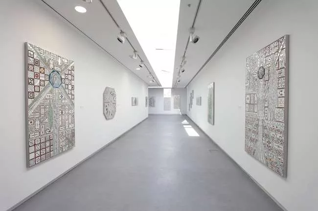 Another gallery shows 90-year-old Iranian artist Monir Shahroudy Farmanfarmaian’s take on a traditional style of mirrored mosaic. Among the best work in the exhibition, the series caught a deser