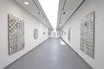 Another gallery shows 90-year-old Iranian artist Monir Shahroudy Farmanfarmaian’s take on a traditional style of mirrored mosaic. Among the best work in the exhibition, the series caught a deser