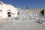 The Pritzker laureates’ outsized suds do little to shade—and the aluminum chairs scattered among them cause some serious glare—but the installation does provide an easy landmark in t
