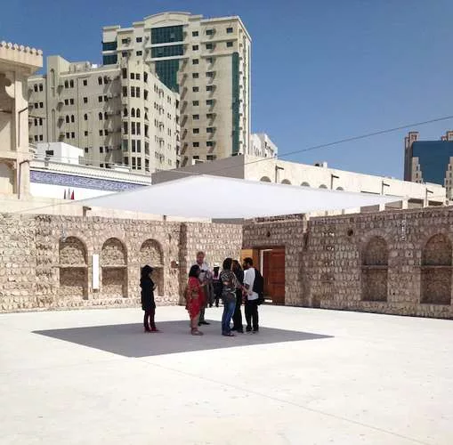 The ersatz historic construction uses a mix of traditional materials—including coral masonry—and contemporary building methods. For the biennial, artists have created site-specific work in