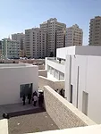 El-Mousfy studied aerial photographs from the 1950s and archival plans to align her structures to the former street plan, which allowed breezes from the Gulf to cool the area’s alleys.