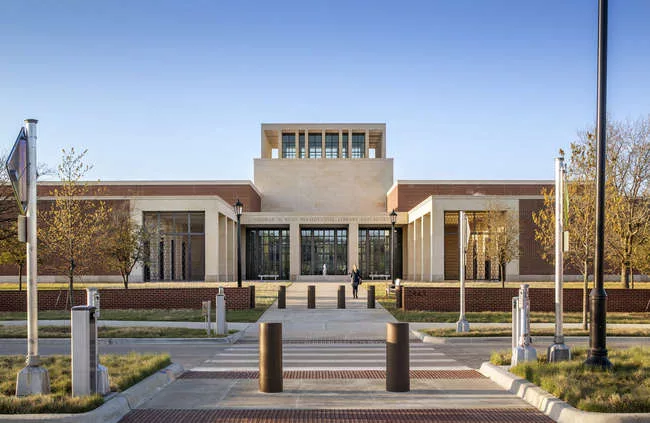 The George W. Bush Presidential Center by Robert A. M. Stern Architects is located on the campus of Southern Methodist University (SMU) in Dallas. Visitors enter through the limestone portico.