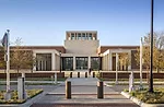 The George W. Bush Presidential Center by Robert A. M. Stern Architects is located on the campus of Southern Methodist University (SMU) in Dallas. Visitors enter through the limestone portico.