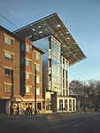 The stair projects from the facade and offers views of downtown’s skyline from the landings.