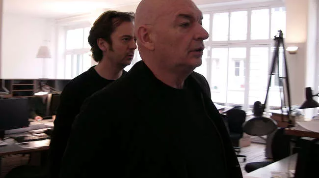 Still from <em>The Competition</em>: Jean Nouvel critiques his project team's design for a museum in Andorra.