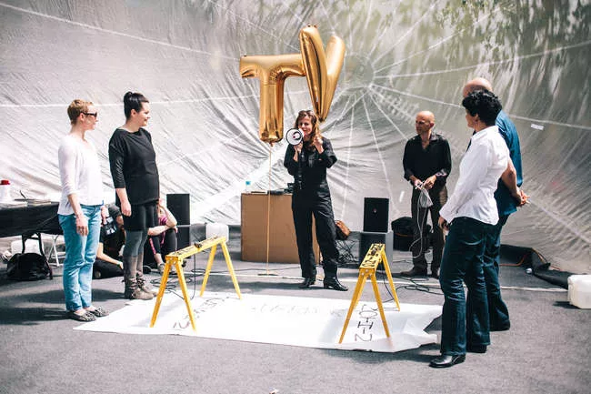 A performance inside Raumlabor's <em>Spacebuster</em>.