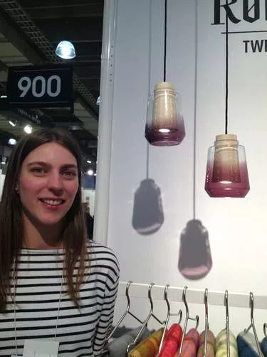 <strong>At ICFF</strong><br /> Designer Marianne Andersen with her “In Theory” lamps, part of the exhibition, <em>The Essence of Things: New Design from Norway</em>, at ICFF.