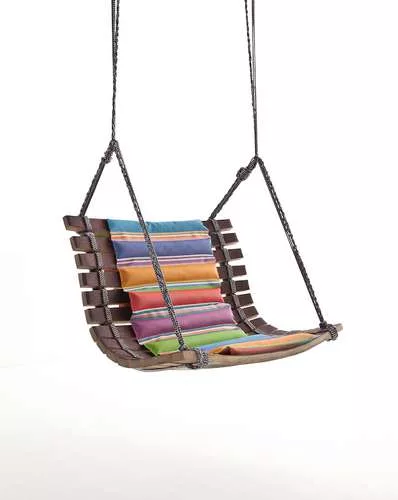 <strong>At the Poltrona Frau Showroom</strong><br /> Made from reclaimed wine casks by members of the San Patrignano Project, an Italian drug rehabilitation program, this “Miss Dondola” sw