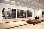A gallery of the new East Building featuring paintings by Gerhard Richter.