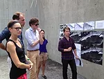 From left to right: Visiting critics Johanna Meyer-Grohbrügge, Niklas Maak, and Sam Chermayeff stand with students Yoonjee Koh and Stefan di Leo, who are living at the Colony at MoMA PS1.