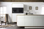 <strong>Air</strong><br />Reminiscent of an Airstream trailer, the Air Range by <a href='www.devolkitchens.co.uk' target='_blank'>deVOL</a> is a contemporary kitchen system featuring curved oak frames