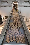 <strong>The Progressive Extension of the Field of Individual Development and Experience</strong><br />This project’s long-winded title belied a simple but elegant cork flooring installation at t