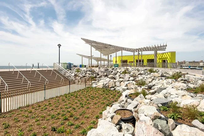 Sage and Coombe Architects’ trellised canopies perch in front of restored concession stands in Queens, N.Y.