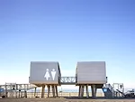 A Coney Island comfort station by Garrison Architects is one of 35  permanent steel-framed modular structures that have been deployed in Queens, Brooklyn, and Staten Island.
