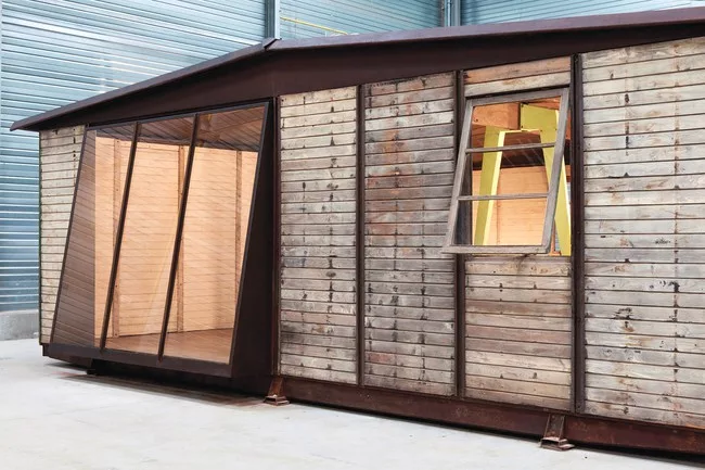 A full-scale construction of one of Jean Prouvé's demountable houses.   Designed in 1945, the 8x8-meter house has been assembled with parts from   the Prouvé factory by Galerie Patrick Segui