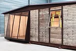 A full-scale construction of one of Jean Prouvé's demountable houses.   Designed in 1945, the 8x8-meter house has been assembled with parts from   the Prouvé factory by Galerie Patrick Segui