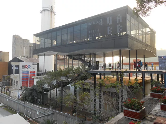 At the entrance to the Value Factory site in Shenzhen, Noreen Heng Liu of Node Architecture designed a restaurant standing on columns above an existing concrete structure.