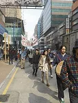 Residents of the Kwun Tong area protesting the opening of the Hong Kong Biennale and the gentrification of their neighborhood.