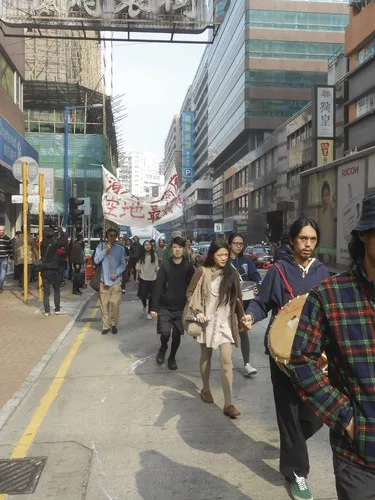 Residents of the Kwun Tong area protesting the opening of the Hong Kong Biennale and the gentrification of their neighborhood.