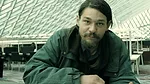 <p>Film Still from <em>REM</em>:</p><p>A homeless man takes refuge in OMA’s Seattle Public Library</p>