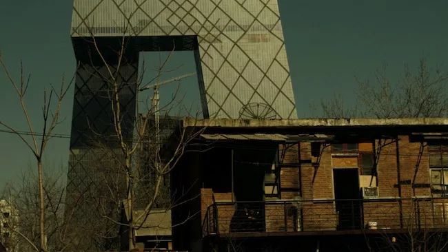 <p>Film Still from <em>REM</em>:</p><p>The buildings that surround the CCTV Headquarters</p>
