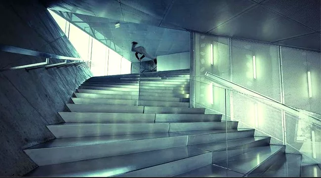<p>Film Still from <em>REM</em>:</p><p>Free running (a martial arts discipline akin to <em>parkour</em>) in OMA’s Casa da Música</p>