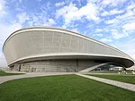 <strong>Adler Arena</strong><br /><strong>Architect: StoryInternational with Cannon Design</strong><br />The architects gave this speed-skating venue a relatively tame blue and gray glass entrance, bu