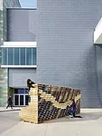 The 18-foot, undulating, plywood <em>Waller Wall</em>, created by architect Murray Legge’s Design 5 studio at The University of Texas at Austin School of Architecture, was filled with more than 