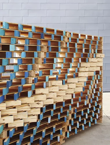 The 18-foot, undulating, plywood <em>Waller Wall</em>, created by  architect Murray Legge’s Design 5 studio at The University of Texas at  Austin School of Architecture, was filled with more tha