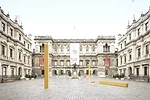 Álvaro Siza's three yellow concrete columns in the gallery’s exterior courtyard.
