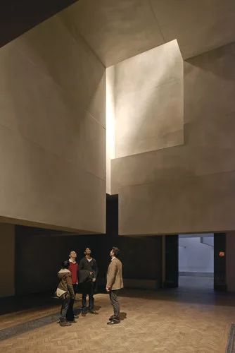 Grafton Architects installed a series of sculptural, suspended volumes in the roof.<br />