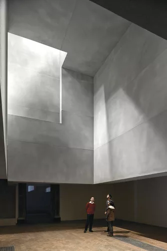 Grafton Architects installed a series of sculptural, suspended volumes in the roof.