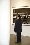 Frank Gehry observes his curatorial work at Milk Gallery.