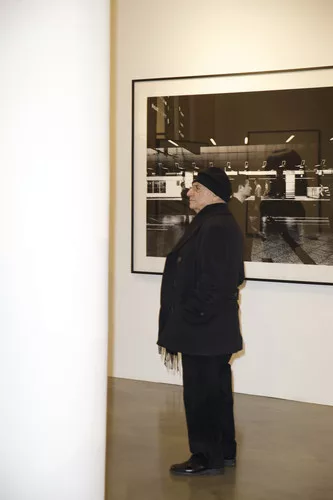 Frank Gehry observes his curatorial work at Milk Gallery.