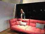 Patricia Urquiola with her Husk sofa at the B&amp;B Italia showroom.