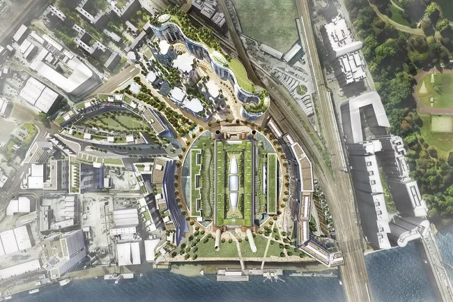 An aerial view of Frank Gehry's and Foster + Partners' designs for residential buildings that will be part of London’s redeveloped Battersea Power Station site.