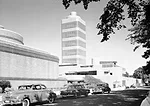 Frank Lloyd Wright designed the tower to serve as the vertical accent to his previously designed Administration Building. (c. 1950)